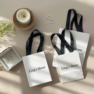 White Handbag with Customizable Logo for Packaging Decoration Candies Gifts Bags