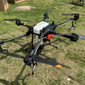 Dual-Purpose Agricultural Drone Specialized in Spraying and Fertilizer Spreading