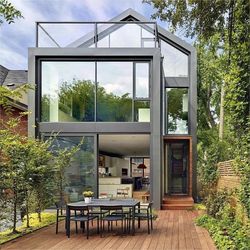 Affordable Aluminum Container Home Featuring Stylish Glass Sunroom