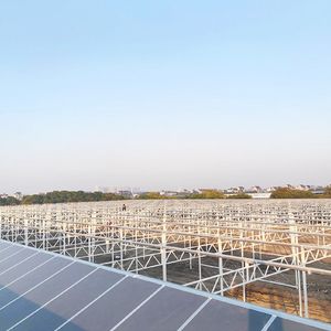 Large-Scale Glass Greenhouse for Commercial Farming with Automatic Irrigation and Cooling Systems