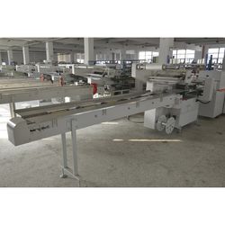 50 -200 Packs/Min Carbon Steel Flow Heat Shrink Packaging Machine with Teco Servo Motor