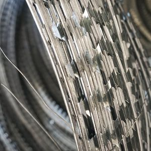 Mobile Razor Wire Security Barrier Rapid Deployment Concertina Triple Coil Barbed Tape