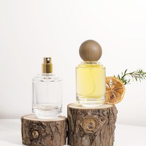 Fragrance Luxury Custom 50ml Clear Round Empty Spray Glass Perfume Bottle with Wood Ball Cap