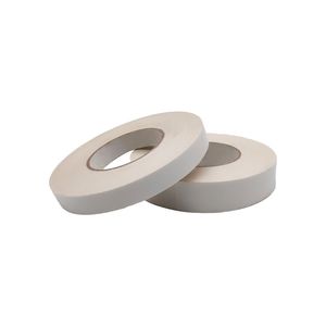Double Sided Tape Bonds Two Surfaces Together Without Visible Fasteners
