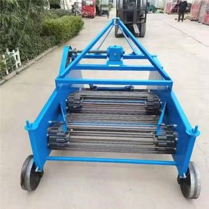 Small-Row Farm Tractor Integrated Sweet Potato and Potato Harvester