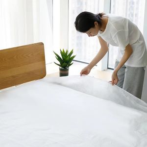 Home Essentials: Portable Non-Woven Disposable Bed Cover, Stain-Resistant & Easy-to-Use