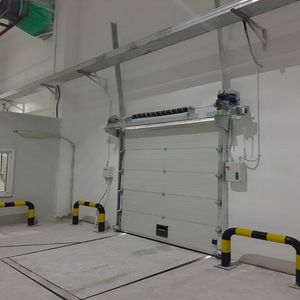 Noise-Reducing Space-Saving Logistics Facility Vertical-Rise Garage Door for Industrial Use