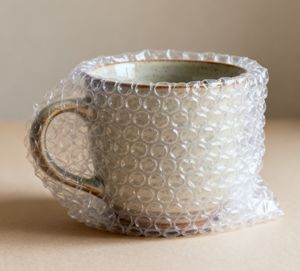 Eco-Friendly Air Bubble Padding - Clear Perforated Sheets for Boxes and Bubble Mailers