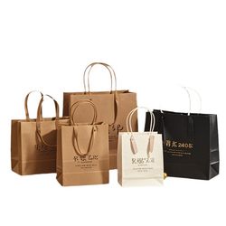 Wholesale Handle Gift Kraft Paper Bag with Customized Stamping Logo