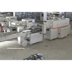 Shockproof and Scratch-Resistant Fs-590 Carbon Steel Automatic Flow Shrink Wrapping Machine