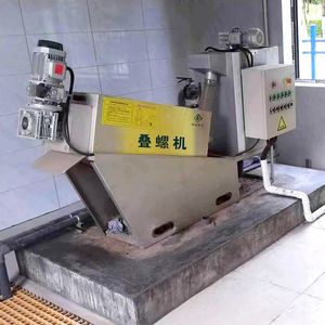 Small-Sized Screw Press Sludge Dewatering Device for Wastewater Treatment
